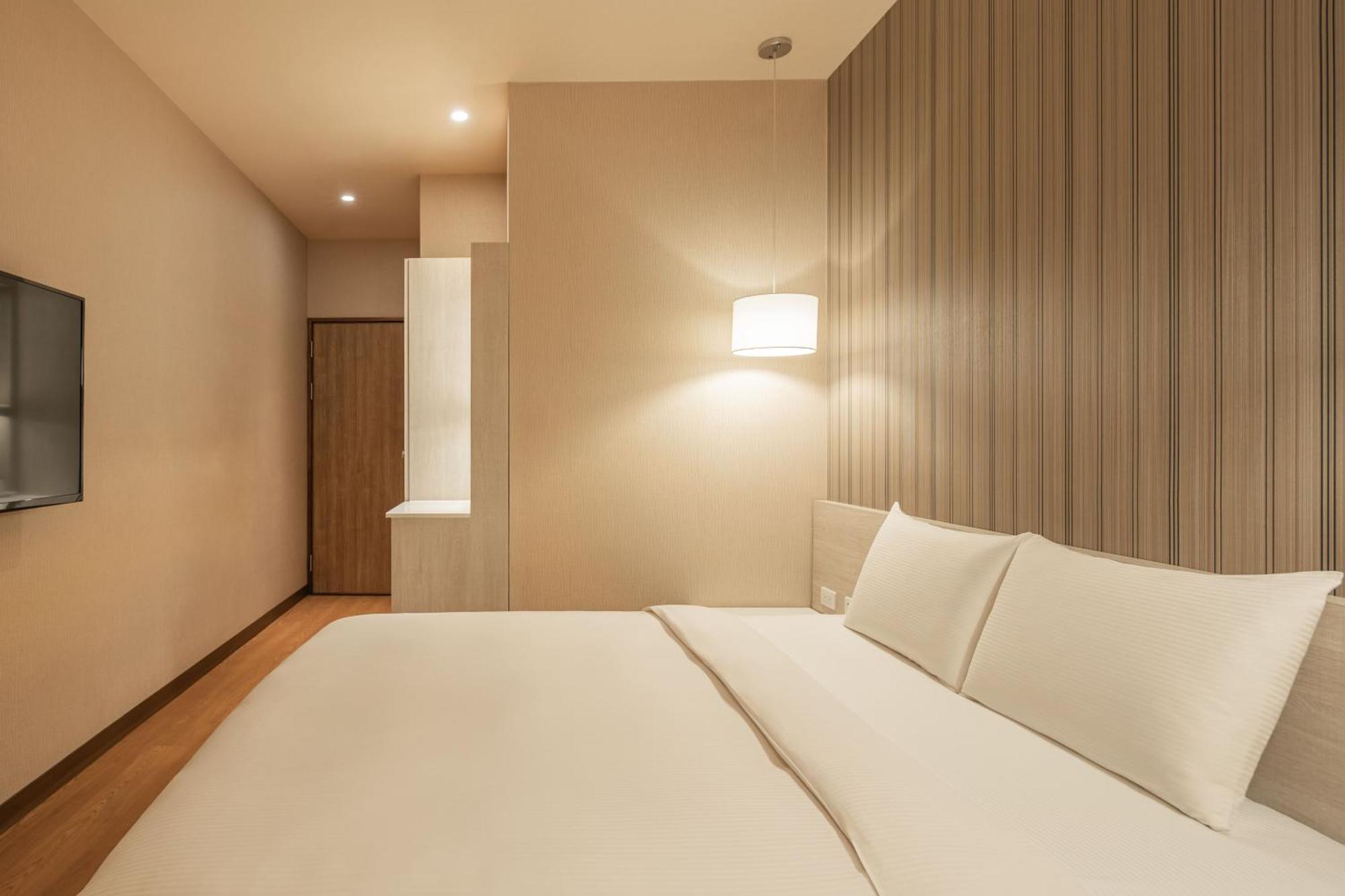 Kindness Hotel-Jue Ming Kaohsiung Quarto foto